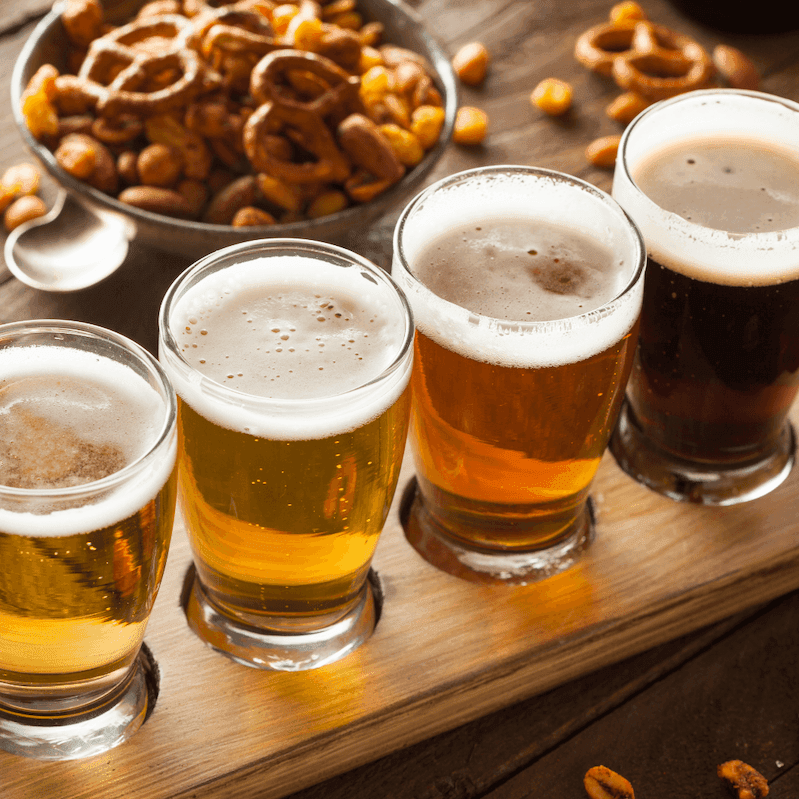 beer flight with snack mix on table - Cape May County Beer Tour with ICONA Avalon