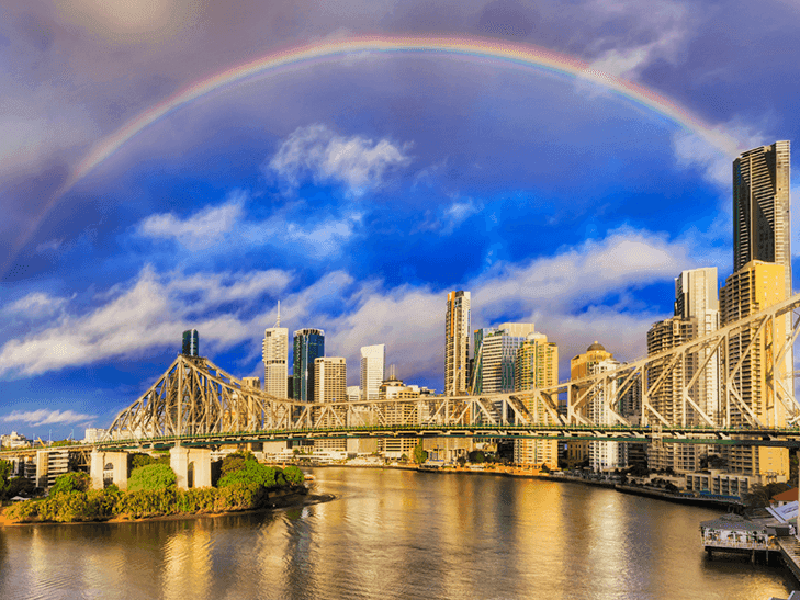 Brisbane and the Story Bridge on a fine day with a rainbow - discover more of Brisbane with this package