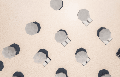 Top view of beach umbrellas & sunbeds at South Beach Hotel