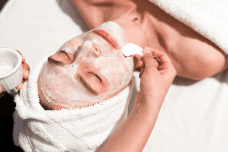 Lady having facial pack in spa at Manteo Resort Waterfront