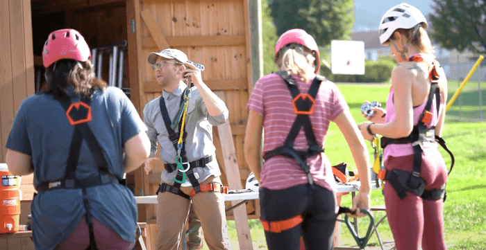 Woman getting ready for rock-climbing at Honor's Haven Retreat