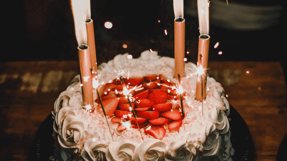Close-up of a birthday cake with lighted sparkles at Sunway Hotel Georgetown