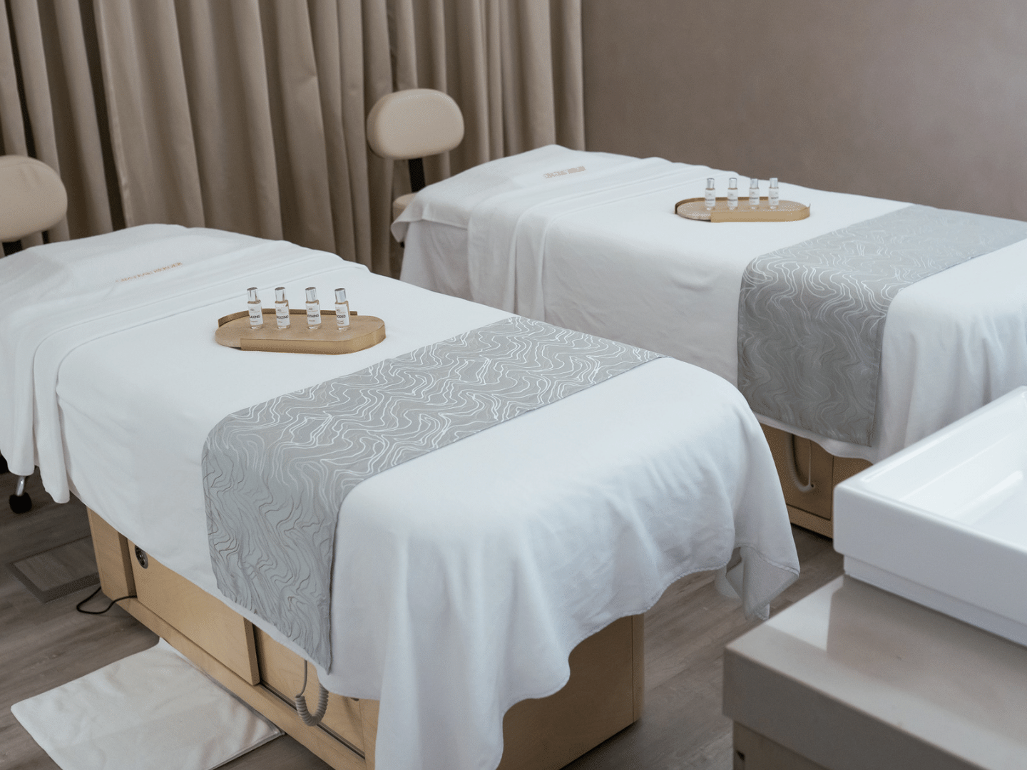 Herbal oils on beds in Pause Spa Château Berger at Paramount Hotel Midtown