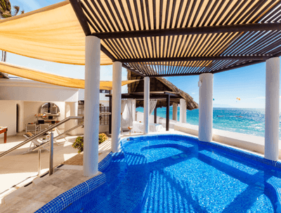Outdoor pool with ocean view in Shakti Spa at Buenaventura Grand Hotel and Spa