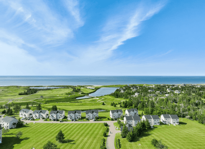 Aerial view of seaside villas and green lawns at Rodd Crowbush Golf Resort, rodd crowbush golf beach resort prince edward