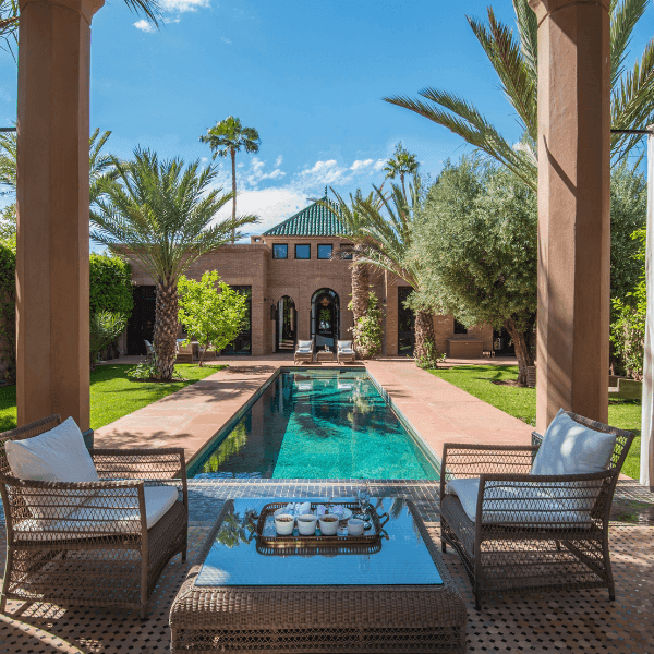 Seating arrangement next to the outdoor pool area at Selman Marrakech