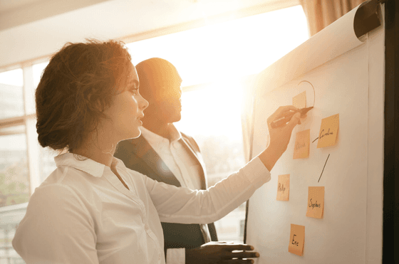 Lady & man drawing mind maps at Amora Hotel Sydney