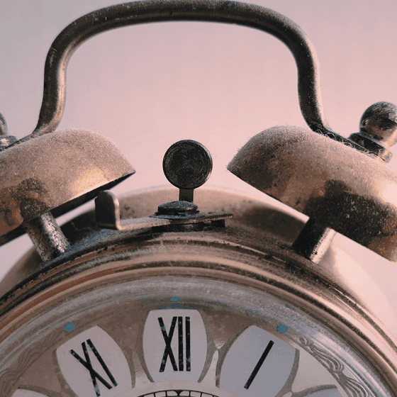 Close-up of a vintage alarm clock at La Tourelle Hotel and Spa