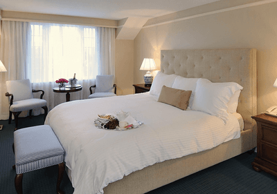 Queen bed room at Classic Hotels in Connecticut