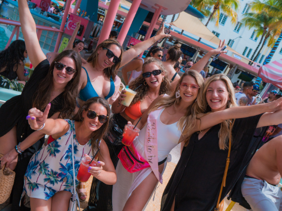 Girl gang posing to a photo at Clevelander South Beach