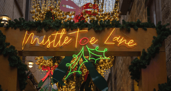 Mistle Toe Lane at night with Christmas decorations in Sydney's The Rocks area