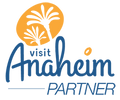 Colored logo of Visit Anaheim partner at The Anaheim Hotel
