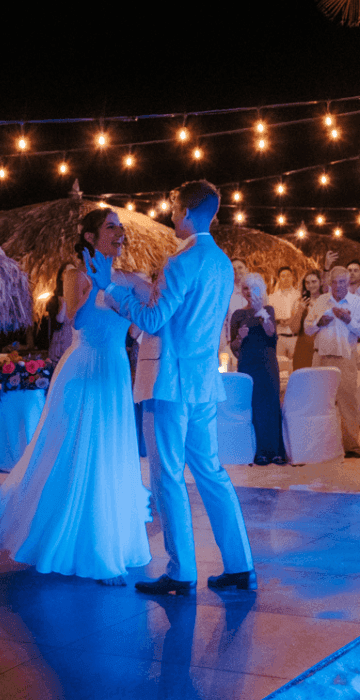 Wedding couple dancing on the beach at Passions on the Beach in Aruba