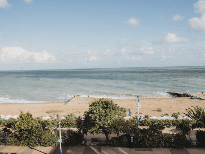 View of beach and ocean from balcony at The View Hotel Eastbourne