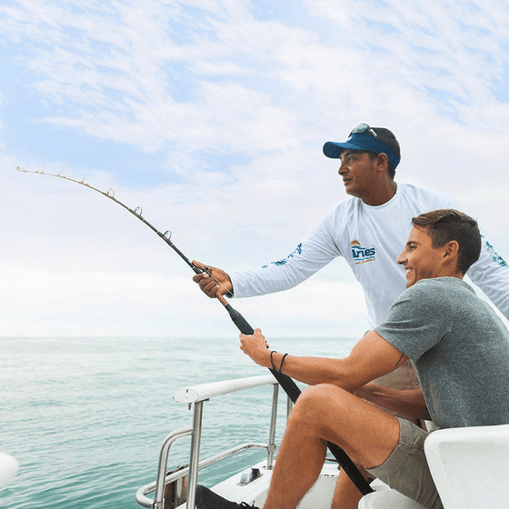 People fishing on a boat in the ocean, Viaggio Resort Mazatlan