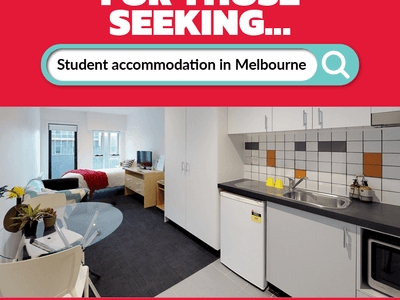 Modern student living room and kitchen with red accent at Student Living - 740 Swanston.