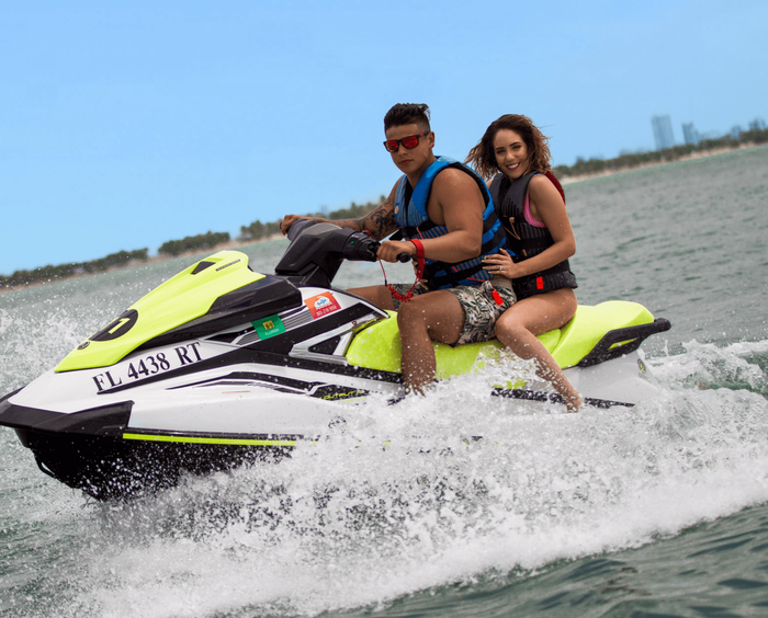 Couple on a Jet Ski  at the beach near The Diplomat Resort