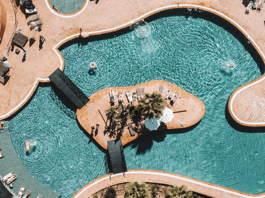 Aerial view of the outdoor large pool area at The Malcolm Hotel