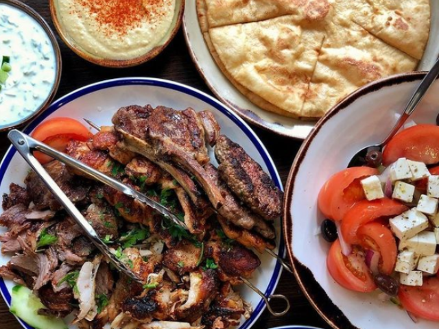 Greek food dishes served in a restaurant at Brady Hotels