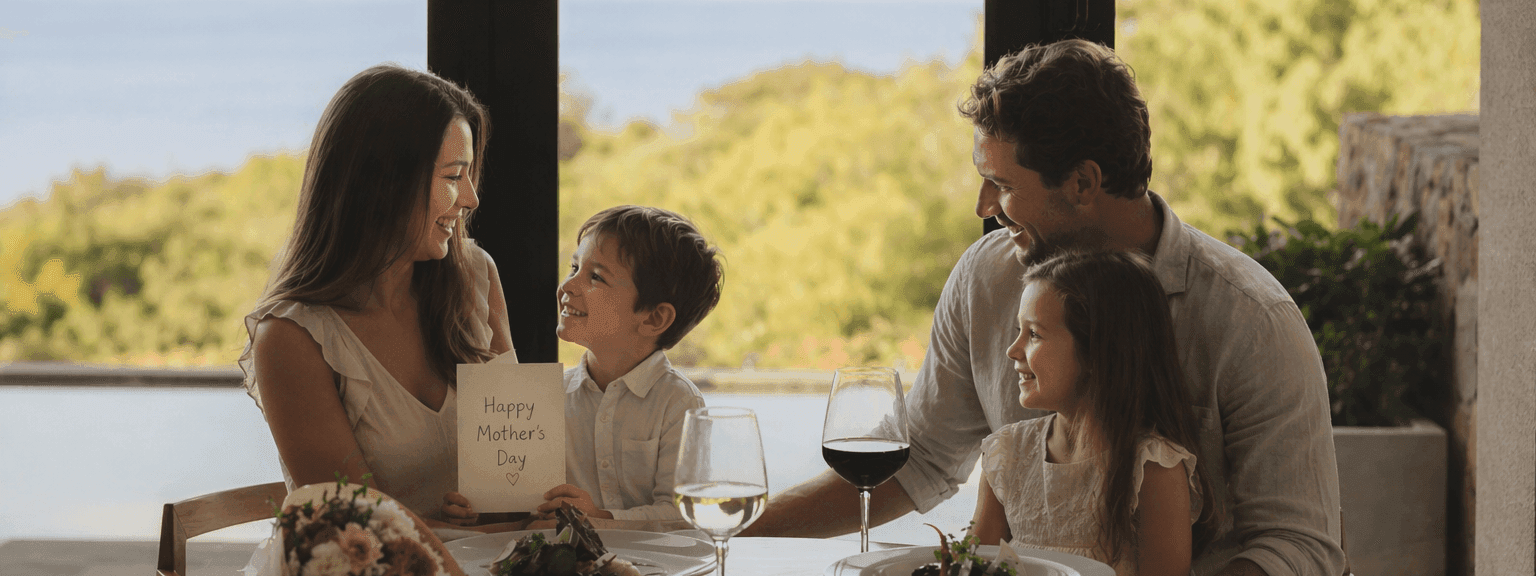 Family celebrating Mother's Day with a meal and flowers.