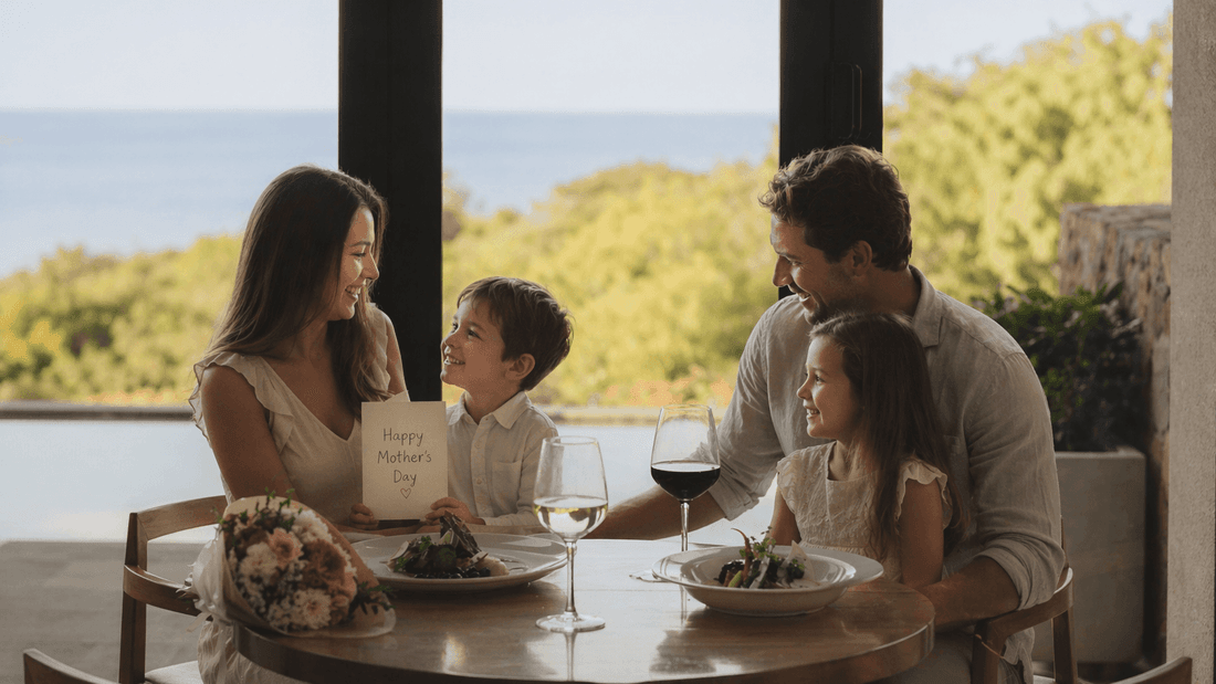 Family celebrating Mother's Day with a meal and flowers.