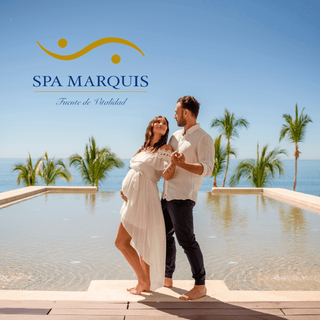 Pregnant woman and a man enjoying a romantic moment by an infinity pool at Marquis Los Cabos