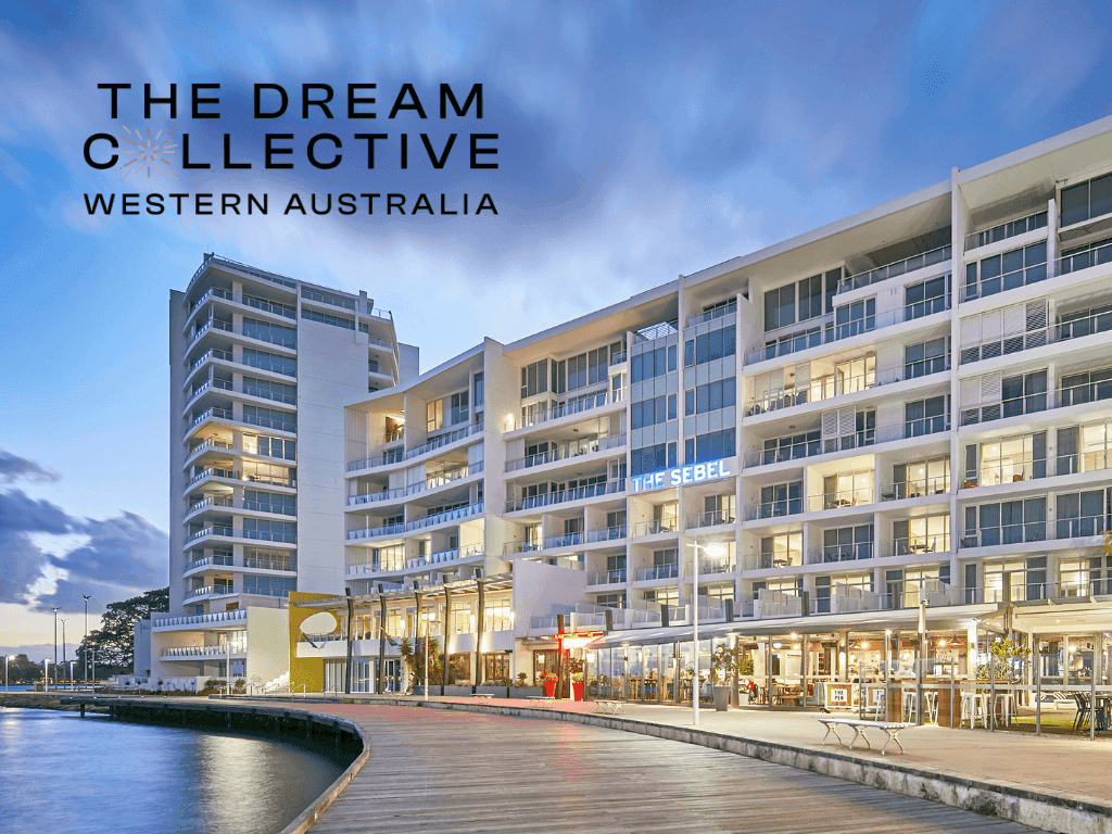 Twilight banner for The Dream Collective, featuring the illuminated Sebel Mandurah hotel by the boardwalk
