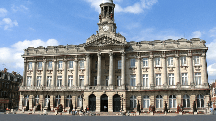 Exterior view of the City Hall of Cambrai near Originals Hotels