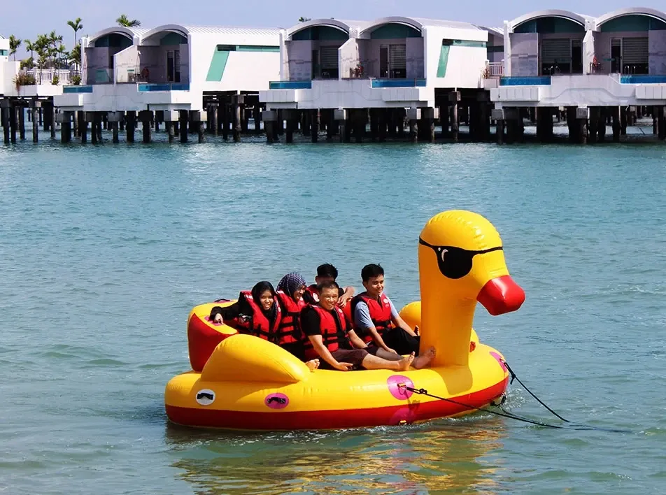 A group of people on the sea yellow duck water activity - Lexis Hibiscus