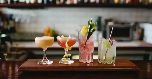 A lineup of cocktails on the bar at Crumpet, Wellington.