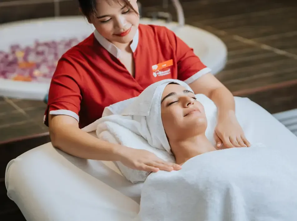 Woman receiving spa and massage in LexSpa - Lexis Hibiscus Port Dickson