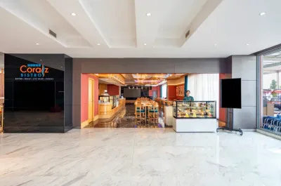 Entrance to Coralz Bistro with display counter - Lexis Hibiscus Port Dickson