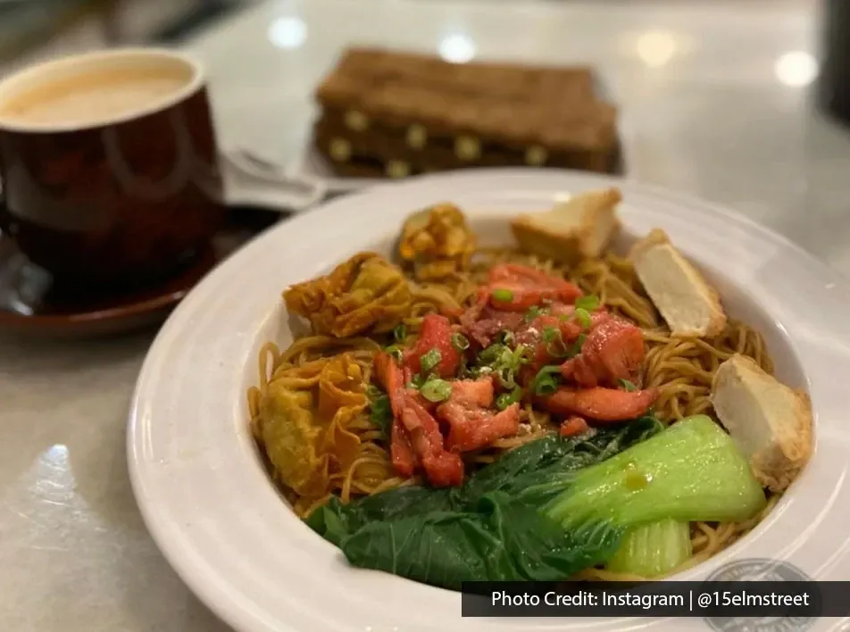 Plate of Malaysian noodles with greens and coffee at Old Town Penang Airport cafe