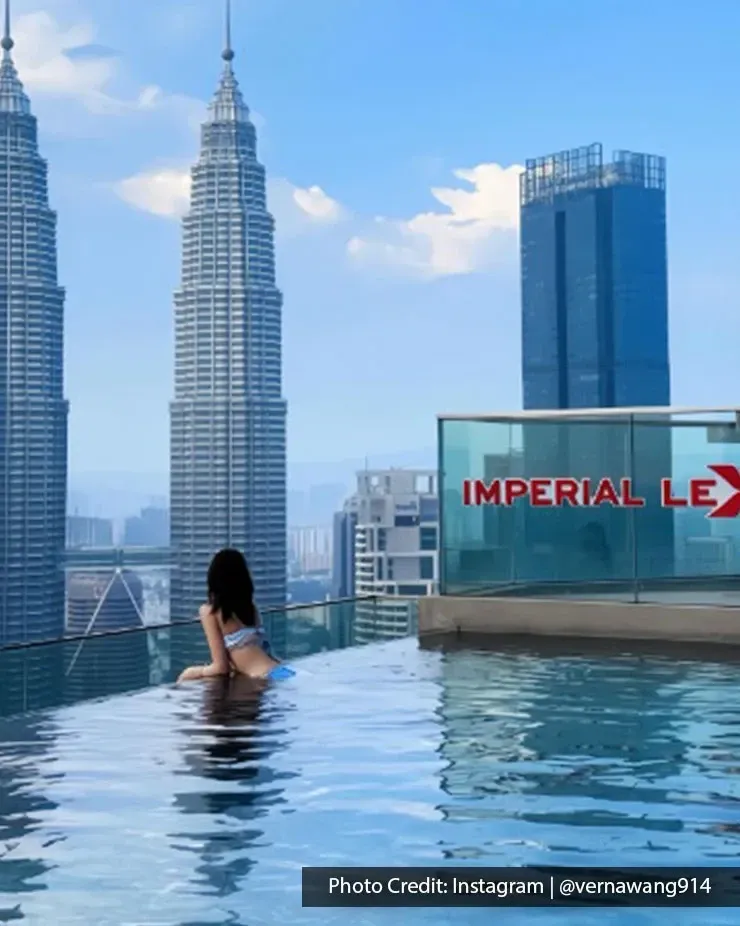 Guest enjoying the infinity pool at Imperial Lexis Kuala Lumpur