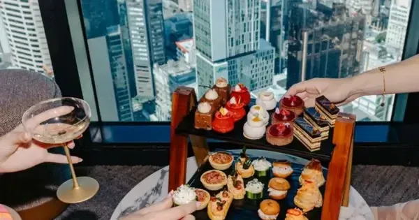  Women enjoy champagne and high tea in SkyBar above Auckland city