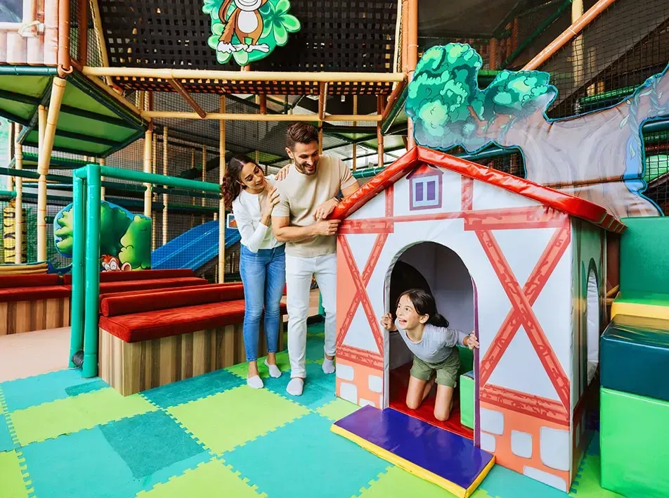 A family having fun playing together at the indoor playground - Lexis MY 
