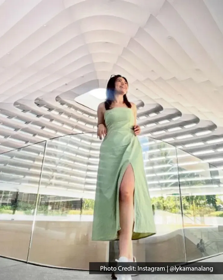 Visitor posing outdoors at The Exchange TRX shopping mall