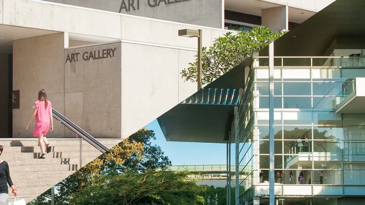 Modern white concrete art gallery building with glass walls, outdoor stairs, and landscaped gardens at QAGOMA.