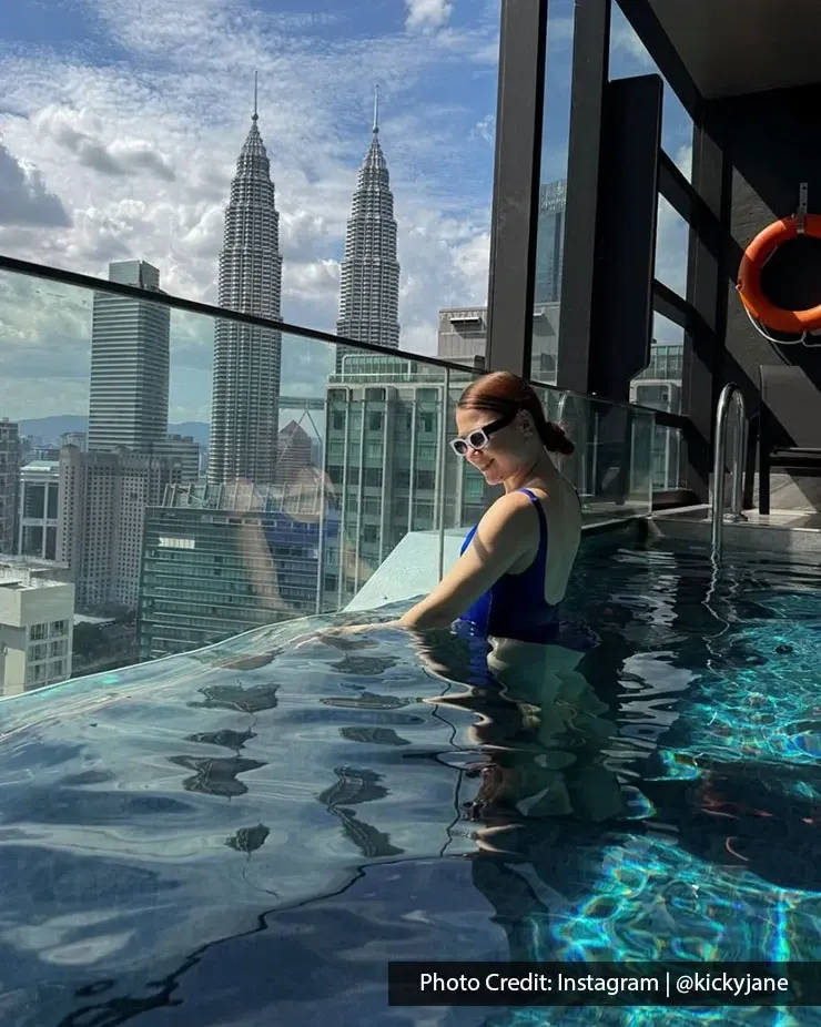Guest enjoying the rooftop pool at Imperial Lexis Kuala Lumpur