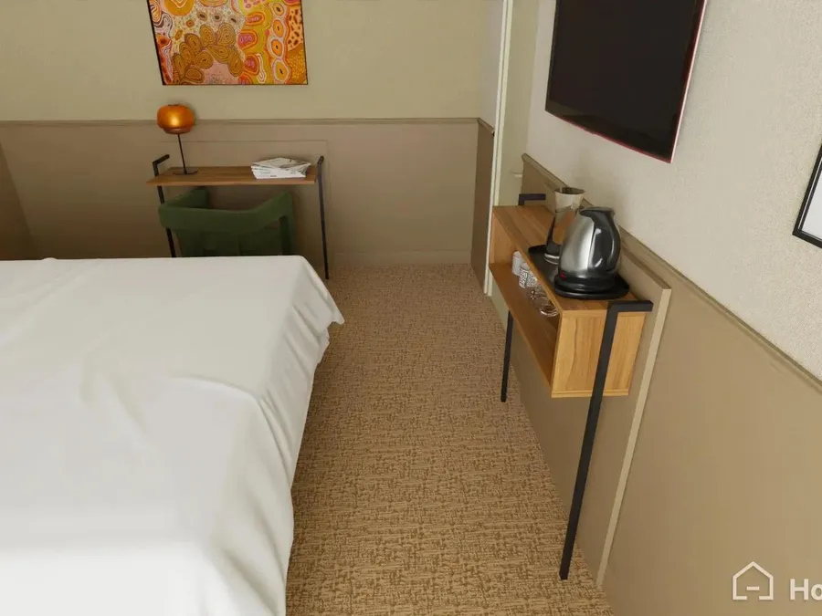 Chambre confortable avec lit blanc, bureau, bouilloire et œuvres d'art colorées au Flore Hôtel & Jardin