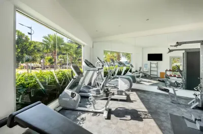Gym with exercise machines and outdoor greenery – Lexis Hibiscus Port Dickson