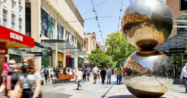Rundle Mall Balls sculpture on crowded street with shoppers