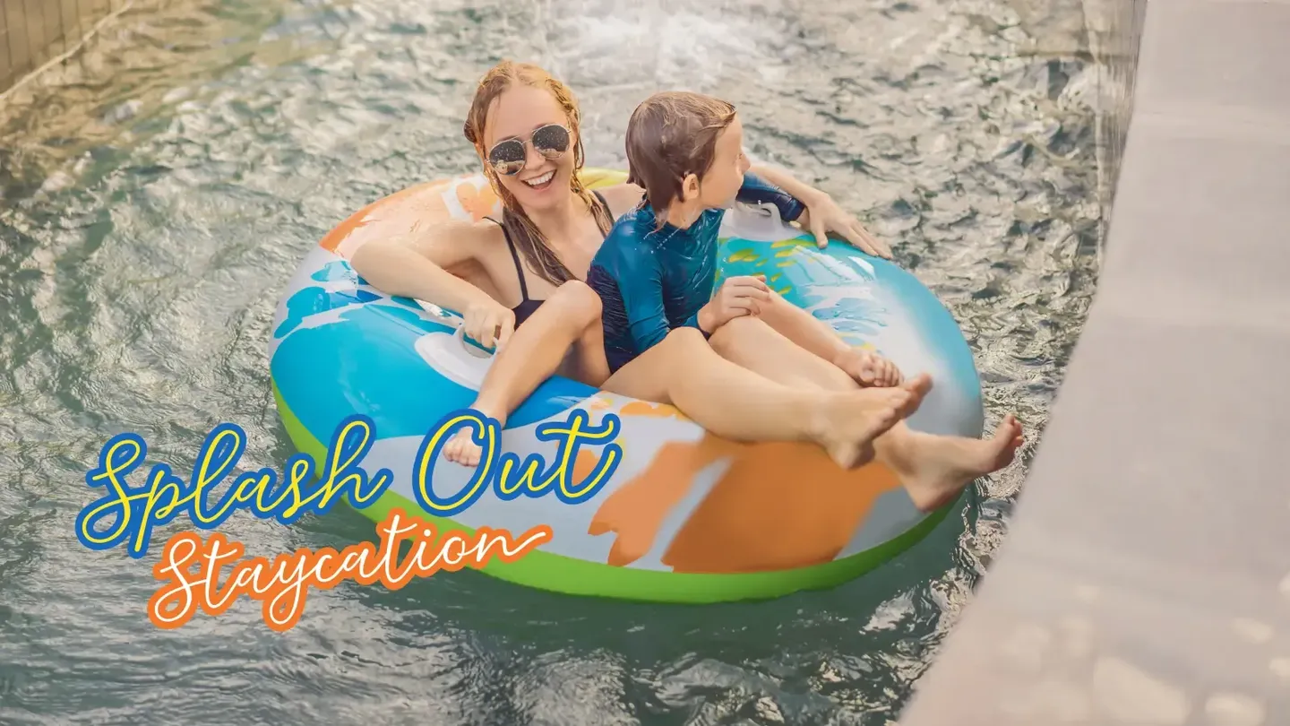 Splash Out Staycation poster with mother and child on a large inflatable ring in the pool at Sunway Velocity Hotel