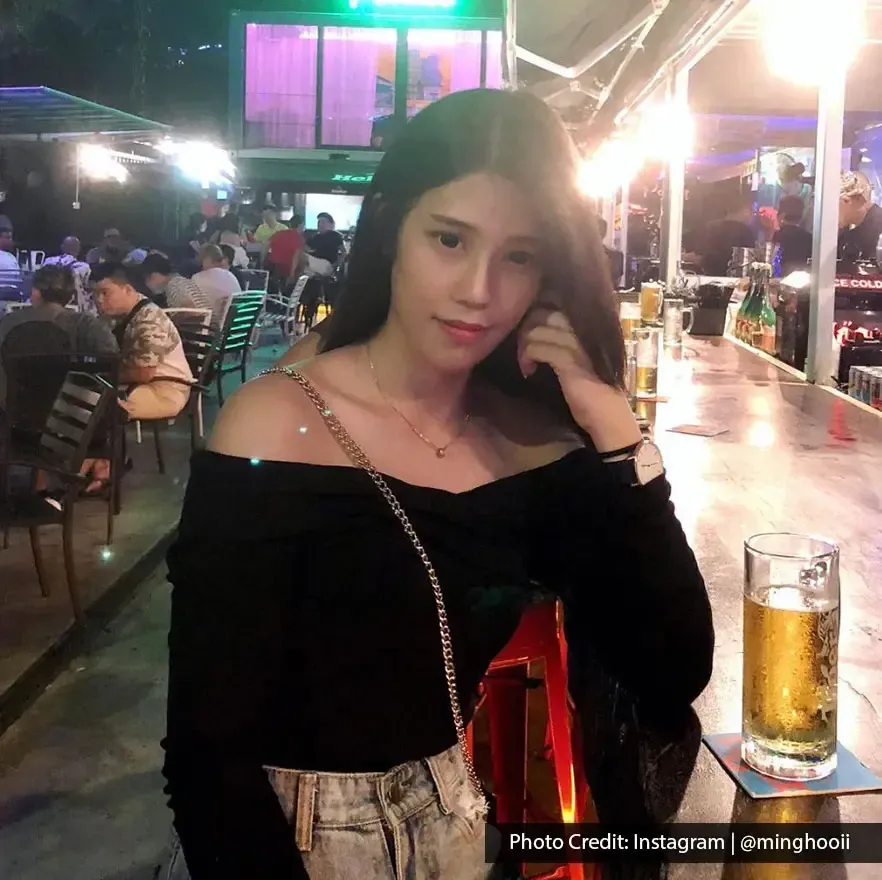 Nightlife scene with woman having drinks at The Pokok – All Day Bar.