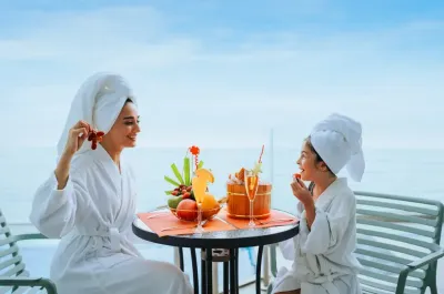 Mother and daughter in robes enjoying bonding time - Lexis Hibiscus Port Dickson