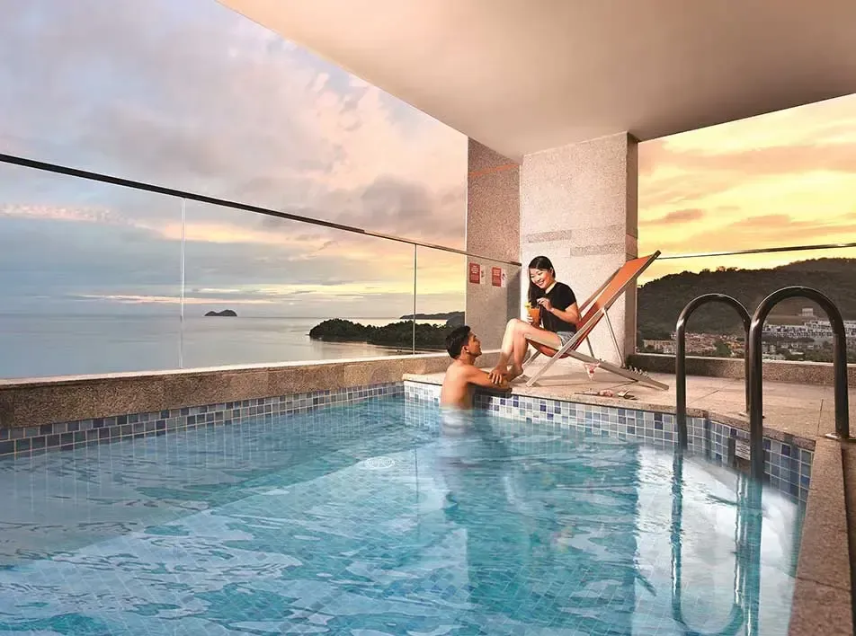 A couple was enjoying the moment in the private pool at Lexis Suites Penang hotel - Lexis Suites Penang