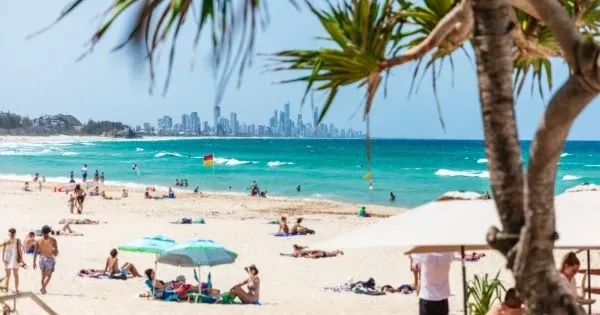 People at Burleigh Beach on day trips from Brisbane