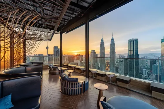 Satellite Restaurant & Bar ROM package with view of Petronas Towers and KL Tower at sunset – Imperial Lexis Kuala Lumpur
