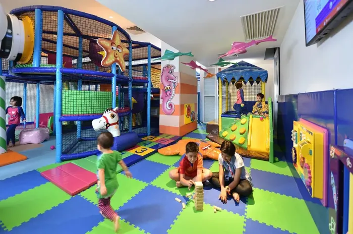 A group of children playing happily inside Kidz World - Lexis Suites Penang