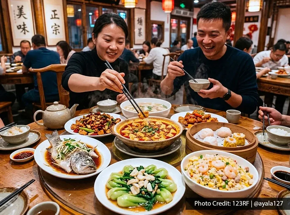 Diners enjoying Chinese food at a restaurant in Port Dickson.